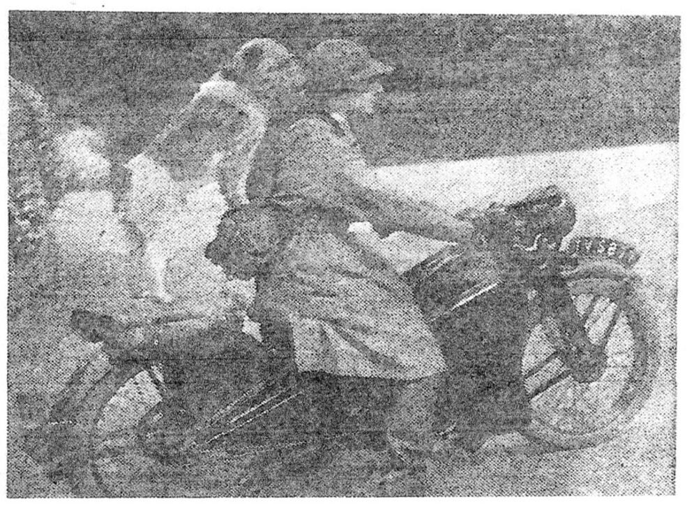 Dr Lucy Burnett with her motorbike and her dog, Christopher
